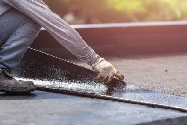 Professional Exterior Waterproofing technician working in Lilburn, GA